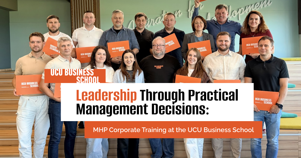 MHP executives discussing business case studies at UCU Business School